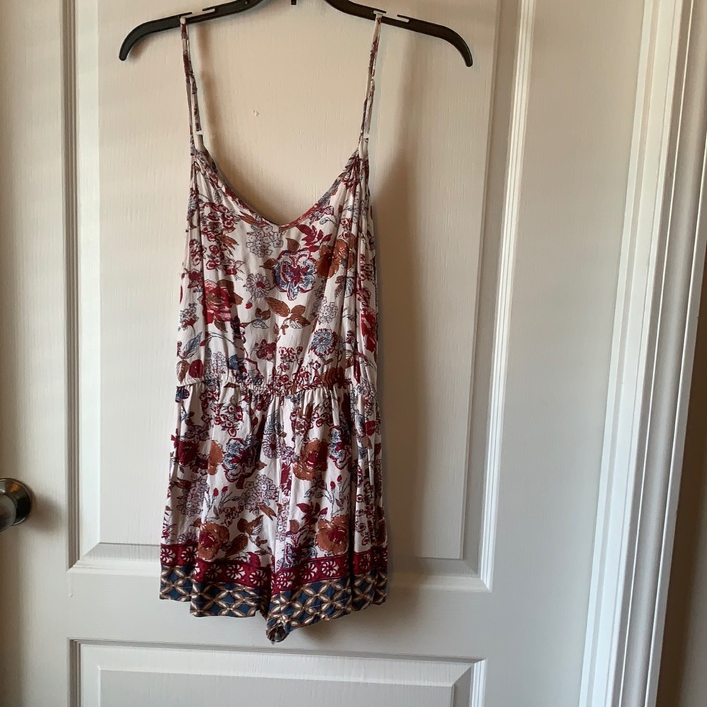 Floral print romper.